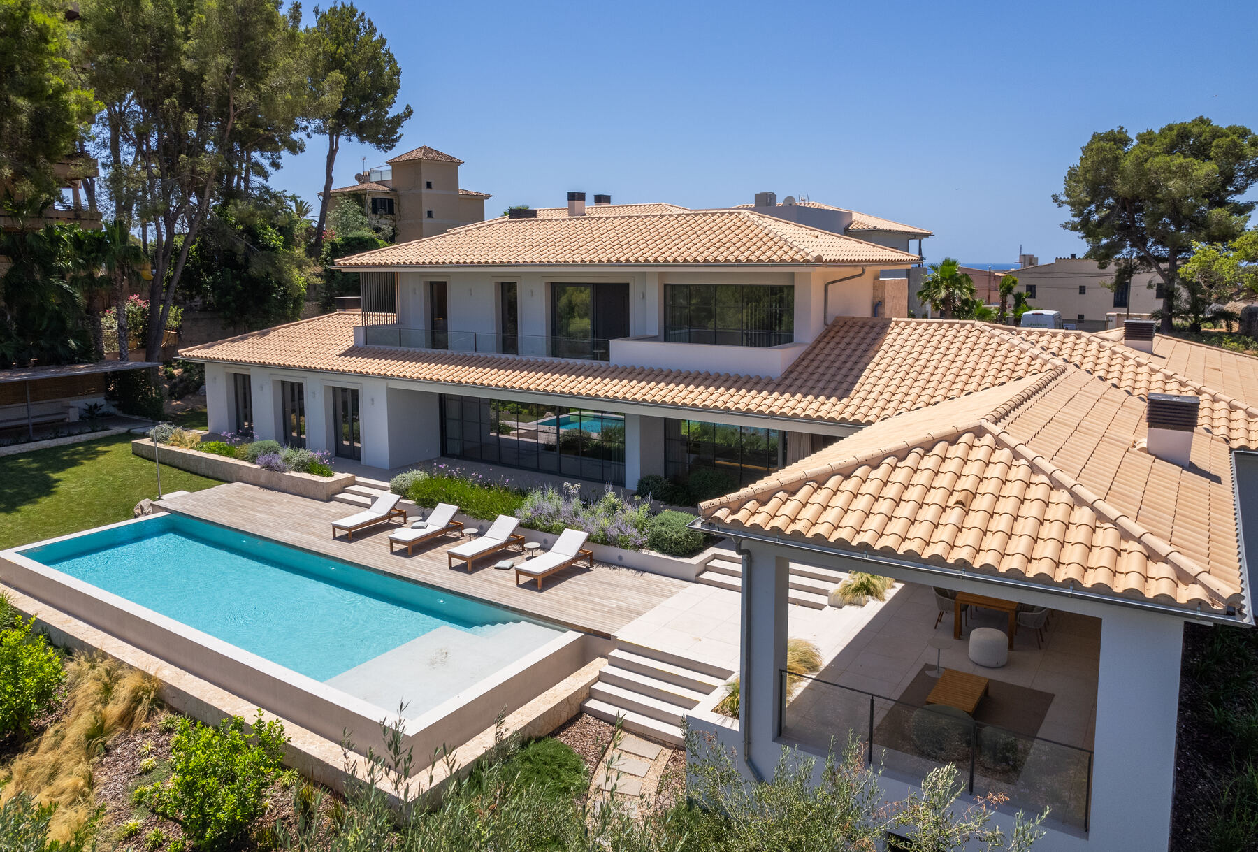 Aerial view of a Mallorca villa with pool, surrounded by pine